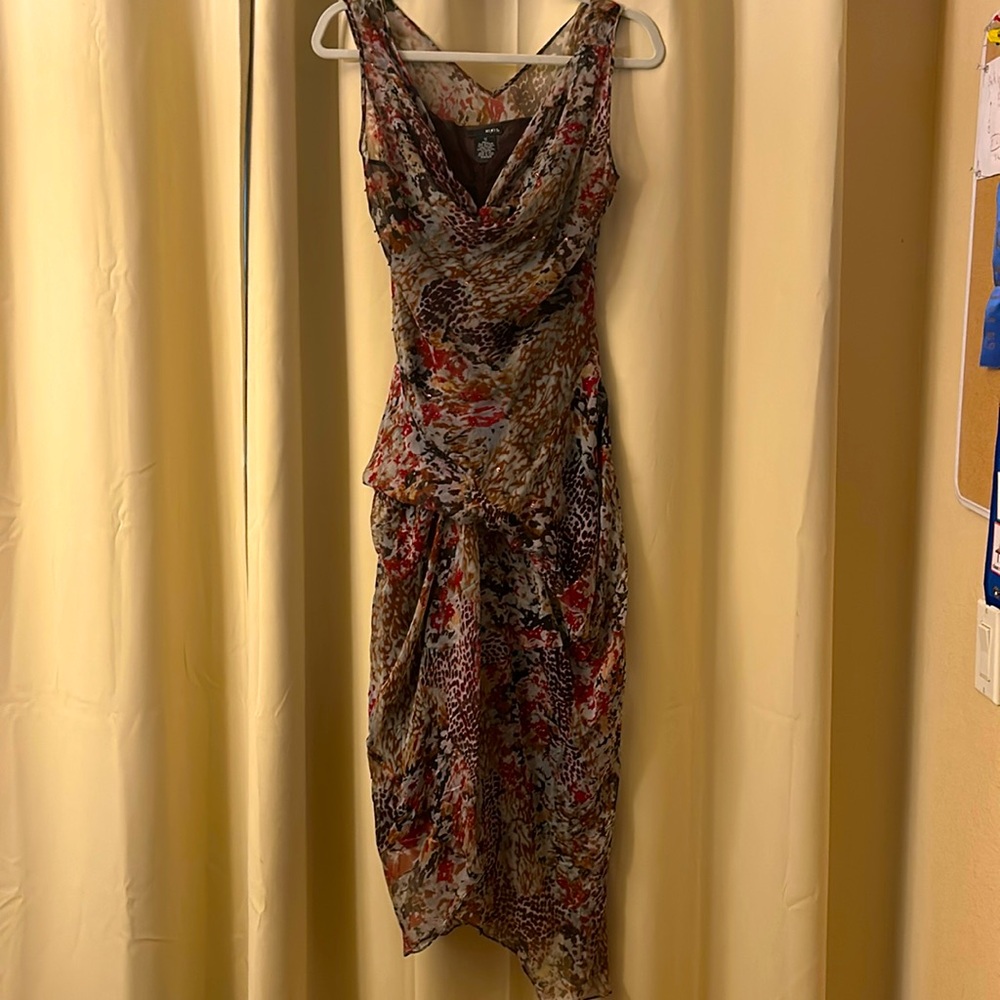 Summer lightweight, sexy dress. Size 12, but fits more like an 8-10.